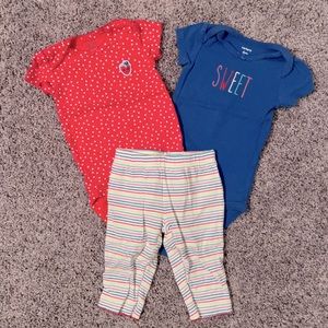 Carters 3 piece outfit. Strawberry striped pants with 2 onesies